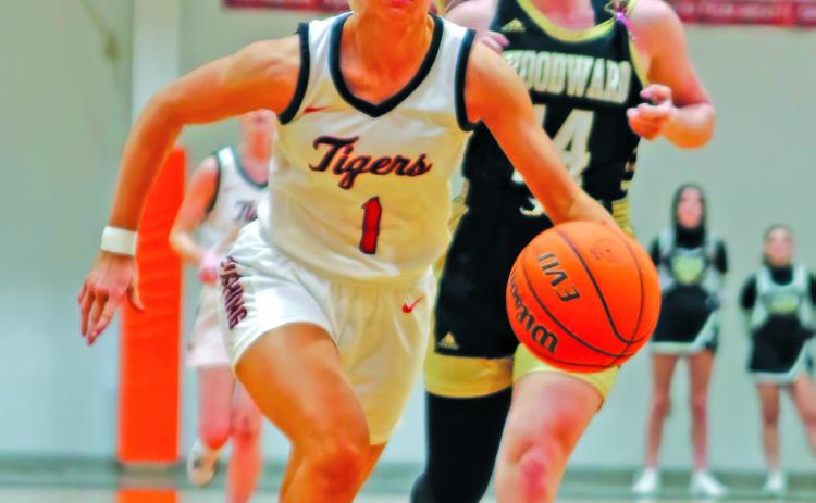 Senior Lady Tiger Kinsley Williams heads for transition basket during the regional tournament hosted by Cushing last week. Photo by Amber Fausto