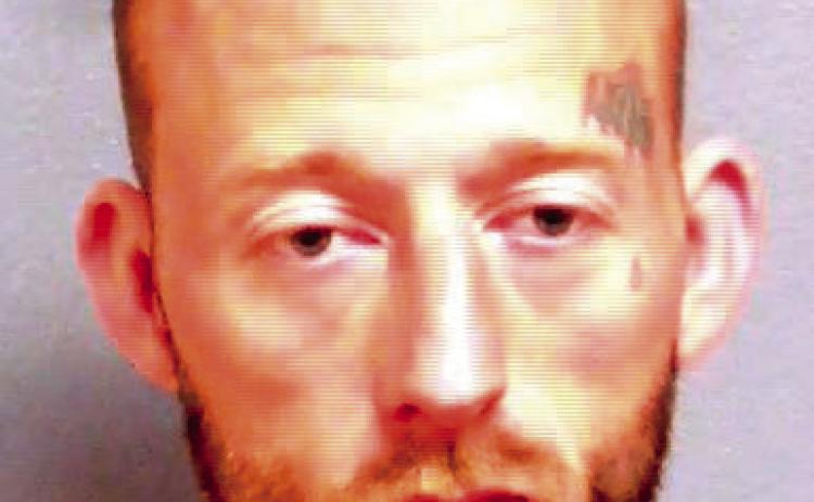 Man arrested with alleged stolen car in Cushing