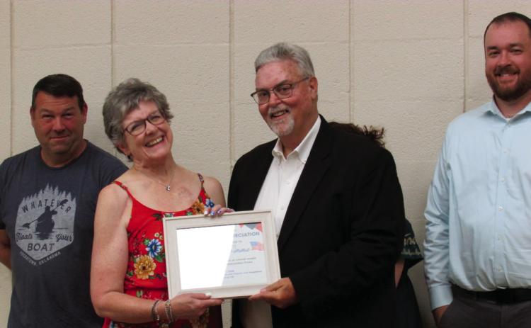 Deyana Simma was presented with an appreciation certificate for her role as the director of the All-American Community Choir that performed during the July 4 event. Photos by DeAnna Maddox