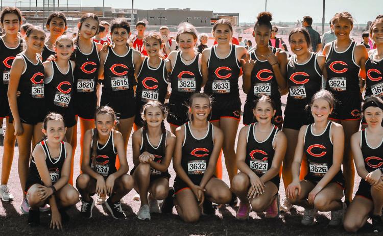 The The Cushing Middle School Girls Cross Country Team finished first at the Tulsa 7 Conference meet last week and sealed the deal on bringing home the Conference Championship. Photos by Sara Townes