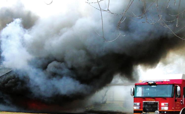 Fire on East Oak destroys three homes