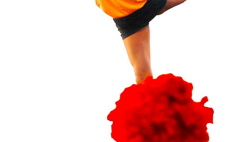 CHS cheerleader Mattie Jones cheers on the Cushing Tigers Friday, as they went on a 41-7 scoring spree in Skiatook. On Saturday the CHS cheer team traveled to Tulsa for State competition and enjoyed their own success, see stories inside this issue. Photo by Sylvia Danielle