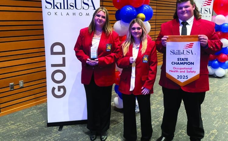 Earning 1st place for Occupational Health and Safety-Multiple Sections for secondary students is (L-R) Keylee Powell, Mannford; Emilee Stephenson, Mannford; Billy Combs, Cushing.
