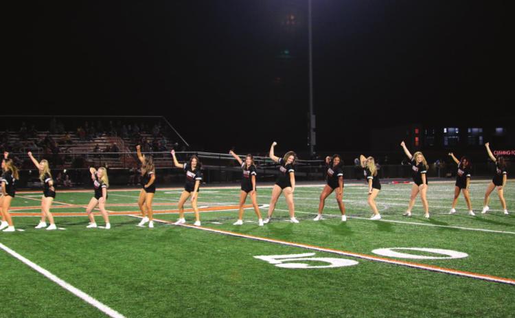 The Cushing Tigers Dance Team strut their stuff at the homecoming game