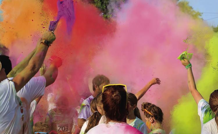 Cushing Geographic Club Do or Dye Color Run participants gather at the end of the race for a color explosion, Saturday, Aug. 19 at Memorial Park. Photo by Allie Prater