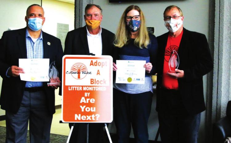 City Manager Terry Brannon, Keep Oklahoma Beautiful’s Jim Evers, Volunteer Marie Thackray and Cushing Pride Executive Director Richard Thackray, celebrate the. Honors Brannon and Thackray received recently during the virtual Keep Oklahoma Beautiful awards banquet.