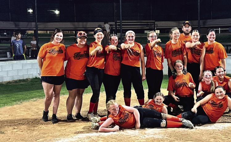 The 12U Cushing Lady Tigers won the Lincoln county league championships in a four-team playoff in Davenport last Tuesday. The team finished the season with a record of 10-2. They are, front row from left, Tyler Leverich, Avery Richardson, Arhyanna Tusler, Grace Lane, Teagan Williams and Rylan Christensen. Back row from left, Coach Haydan Marshall, Coach Laura Green, Harper Jones, Vaeda Nugent, Logan Marshall, Gemma Lane, Willow Peaslee, Coach Dusty Nugent, Ashlynn Stevens and Coach Michelle Nugent.