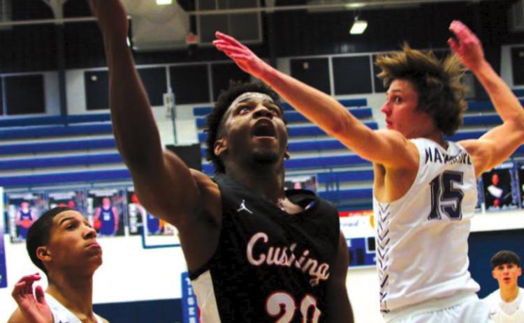 Noah Jones beats the defenders down the lane.