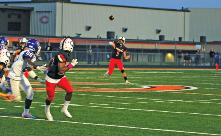 Tigers defeat Harrah in overtime