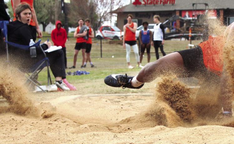 Cushing Senior Noah Jones competes in the long jump during the Cushing Track Meet. Noah placed fifth with a jump of 19’00.05”. Photo by Cindy Wayland.