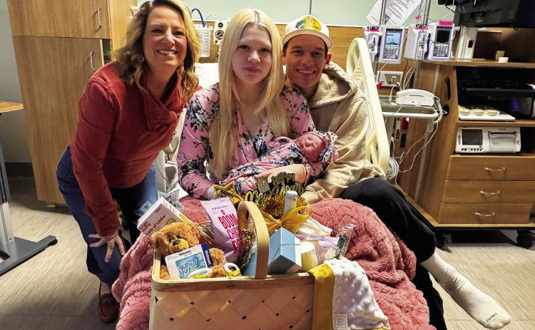 Kammy Peters, director of Women's Health at Stillwater Medical stands with Karrie Tull of Jennings and Braden Morrison of Mannford holding their newborn daughter, Emry Morrison, who was born at 4:40 a.m. Jan. 2 and is the first baby of 2026 at Stillwater Medical. The family was presented with a gift basket from hospital staff to mark the occasion.