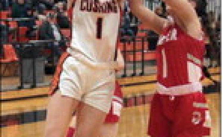 Kinsley Williams goes op fir a transition layup. photo by J. D. Meisner