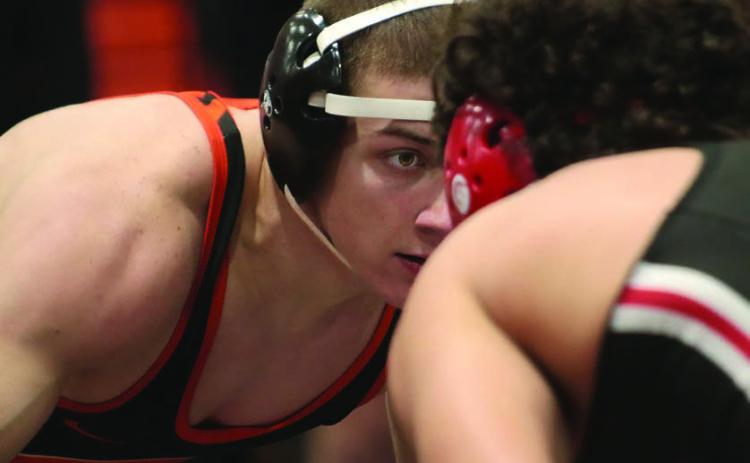 Darren Stewart sizes up his opponent on Saturday at the Cushing Field House.