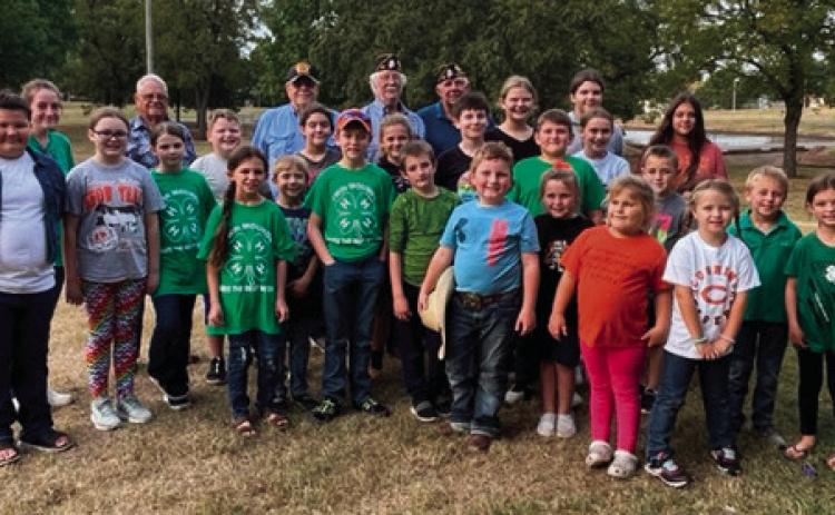 Pictured are Twin Mounds 4H members with American Legion members. Both organizations have done tremendous work for the betterment of their communities.